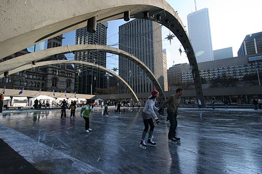People skate at Toronto's Nathan Phillips Square.