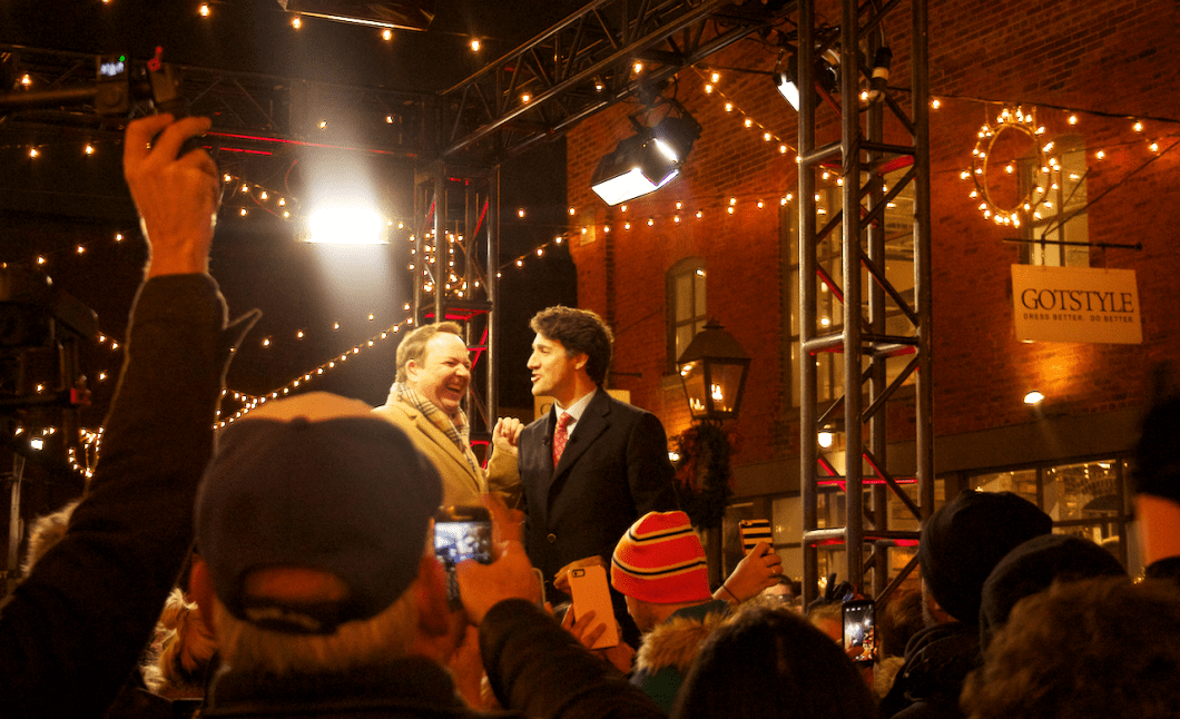 Justin Trudeau speaks with CTV weather man Tom Brown on-stage.