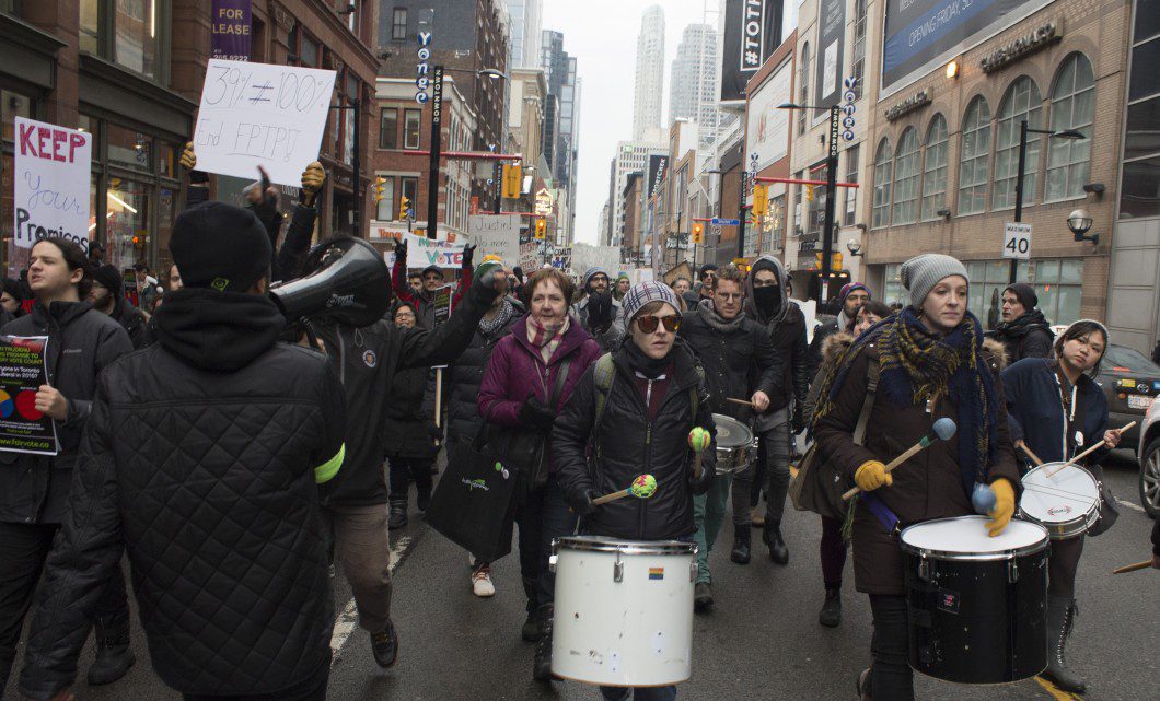 Protesters march to Dundas Square