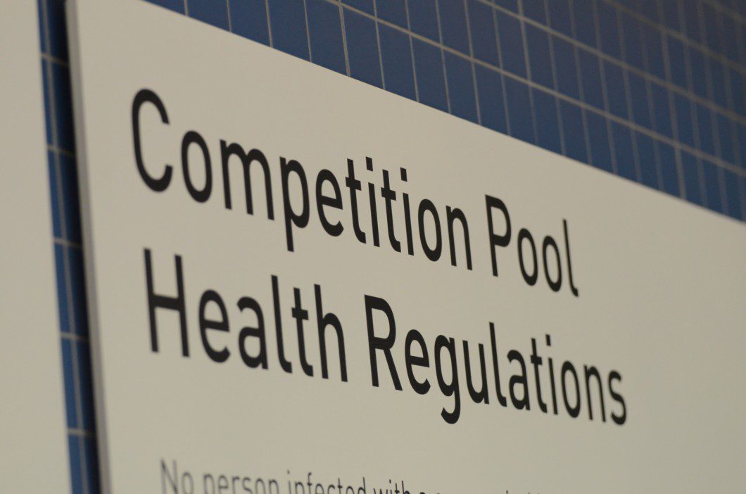 sign at the Competition Pool inside Pan Am pool building