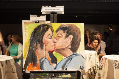Man and a woman kissing painting