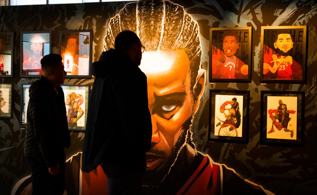 People view "Art of the North' exhibit which featured Toronto Raptors inspired pieces of art