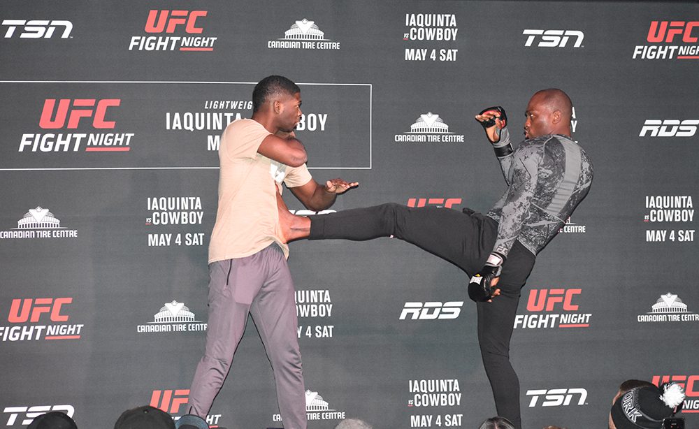 Derek Brunson and training partner show off for the UFC fans during open workouts at Barrymore's Music Hall in Ottawa.