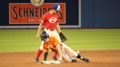 Bryce Arnold steals second base to kickstart Team Orange's third inning rally.