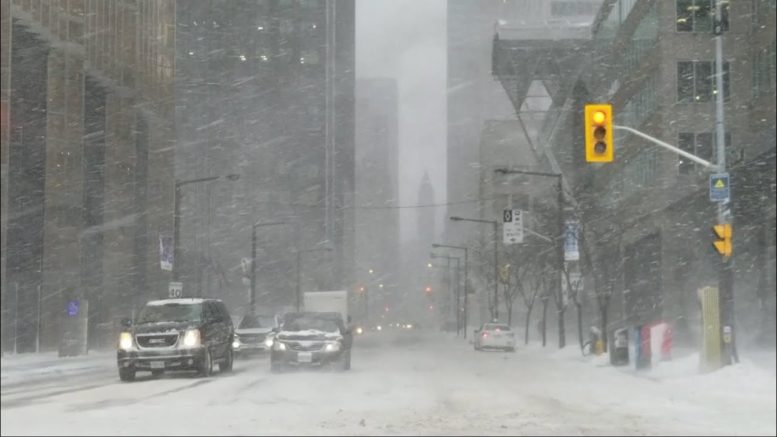 Snow falling in downtown Toronto