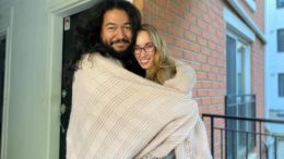 Founders of The Cuddle Couple, Emma Janssen and Pablo Perez, embrace outside their residence.