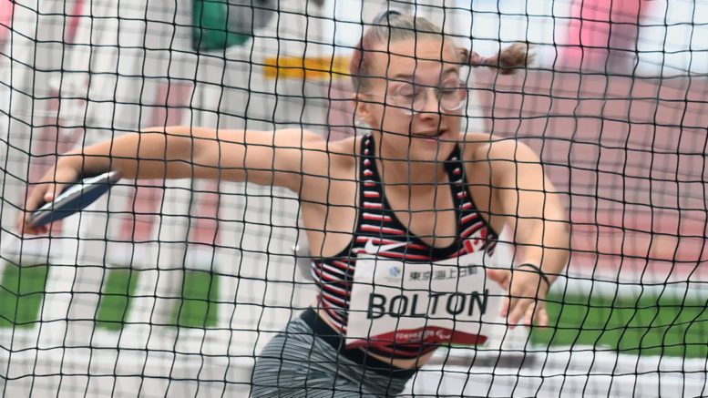 Charlotte Bolton tossing second discus attempt