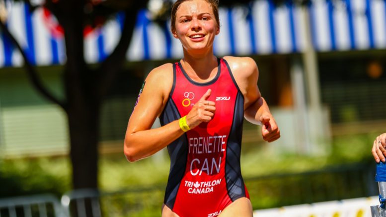 Kamylle Frenette completing the running portion of a para triathlon event. As an experienced runner, Frenette improved her cycling and swimming to compete on the international stage.