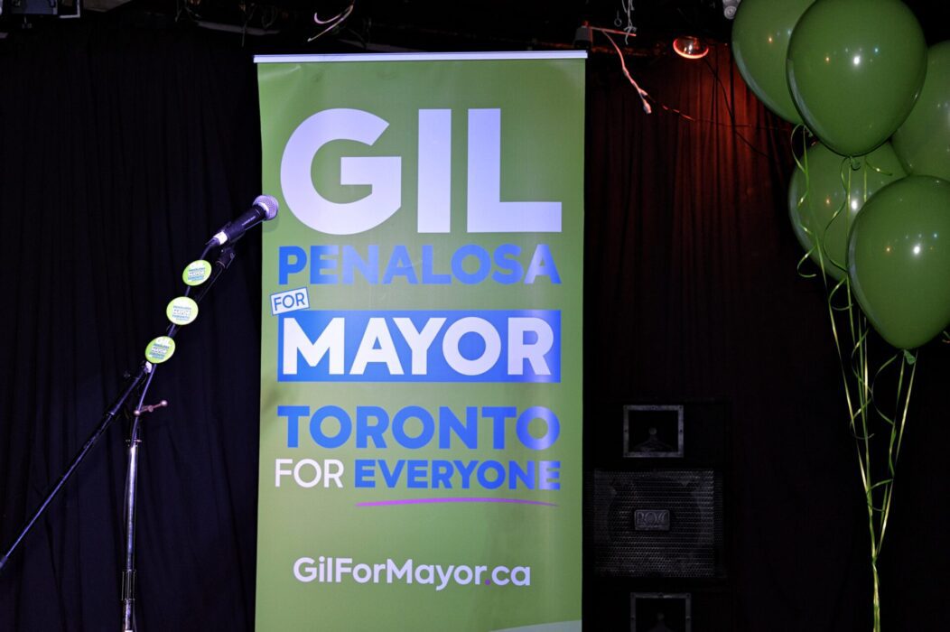 Gil Penalosa's campaign sign that reads his name, followed by FOR MAYOR, TORONTO FOR EVERYONE in blue and white text on a green background