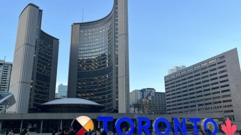 Office of Mayor John Tory located in Downtown Toronto, with lit up TORONTO sign infront