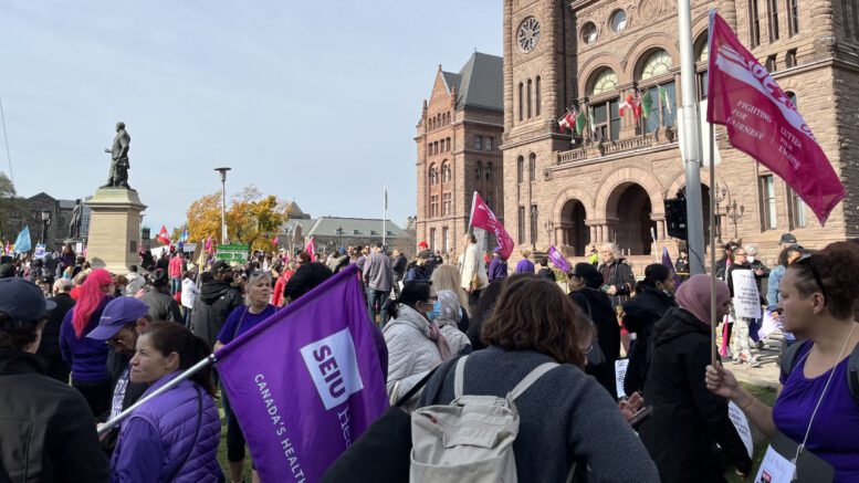 Picketers for CUPE outside Queen's Park protesting the provincial government's use of the notwithstanding clause.