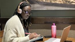 Quiana Pettiford studying in a Starbucks cafe