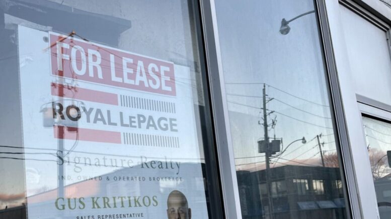 The closed Palace Restaurant on Pape Avenue sports a For Lease sign in the window.