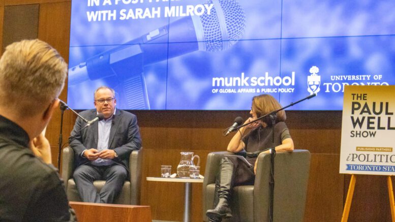 Paul Wells and Sarah Milroy discuss art on a stage.