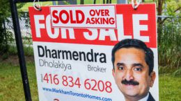 A for-sale sign sits on the front lawn of a corner home near Steeles Avenue.