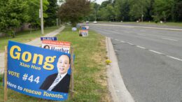 Mayoral campaign signs line the the road along Finch Avenue East