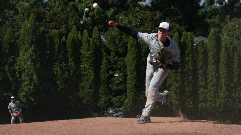 Liam Oates works his way through an excellent five-inning perfect game against Sault College. (Zeno Fu/Toronto Observer)