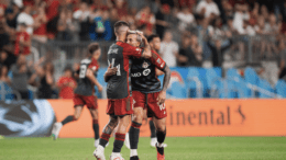 AUGUST 21 - Lorenzo Insigne (left) embraces Federico Bernardeschi in a game against Montreal [Lucas Kschischang/Toronto FC]