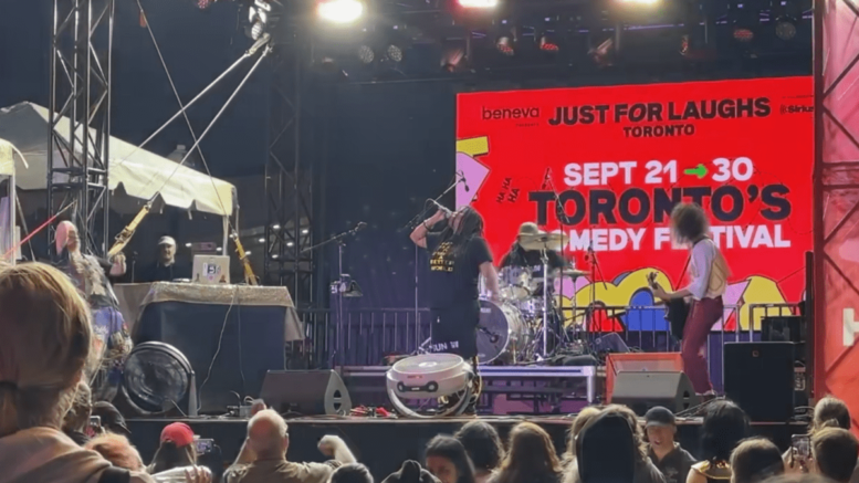 Witch Prophet singing at the annual Just For Laughs Toronto Festival.