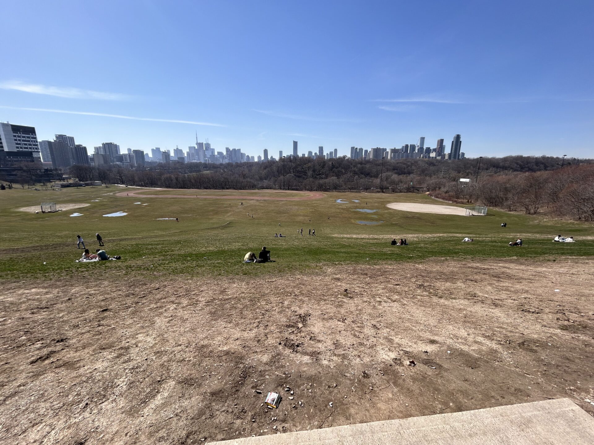 Broadview Hill is without snow and people sitting in the sun