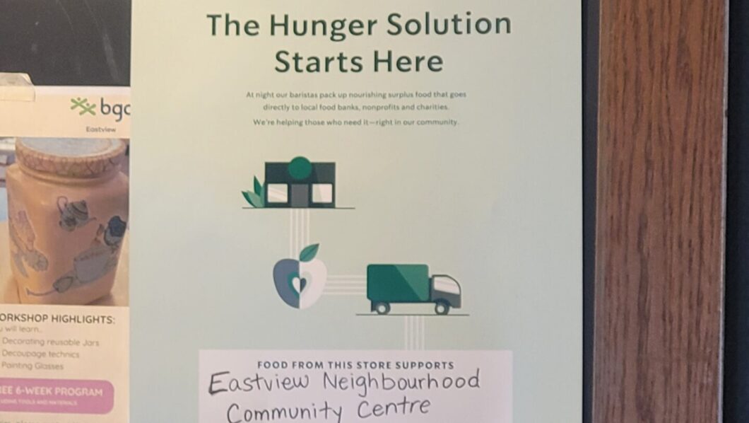 A sign posted to the community board in Starbucks (located at 604 Danforth Ave) mentions the Second Harvest food rescue program partnership, through which unsold items are donated to local food banks.